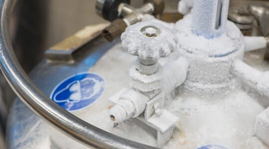 Close up of container with liquid helium