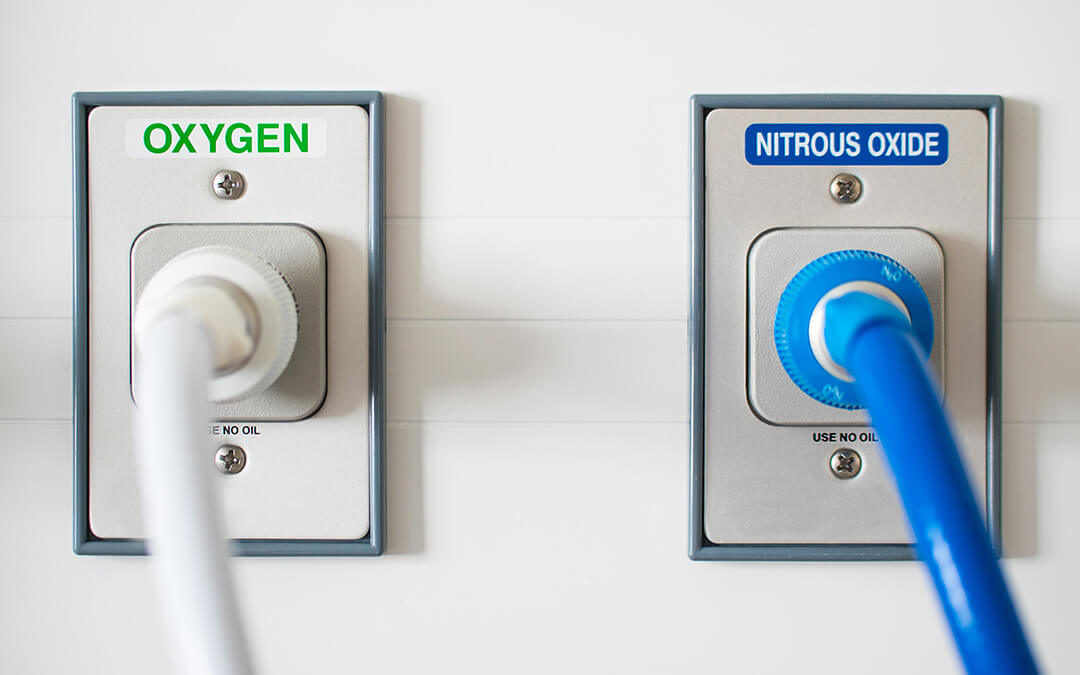 Two wall outlets for Oxygen and Nitrous Oxide. Tubes are connected