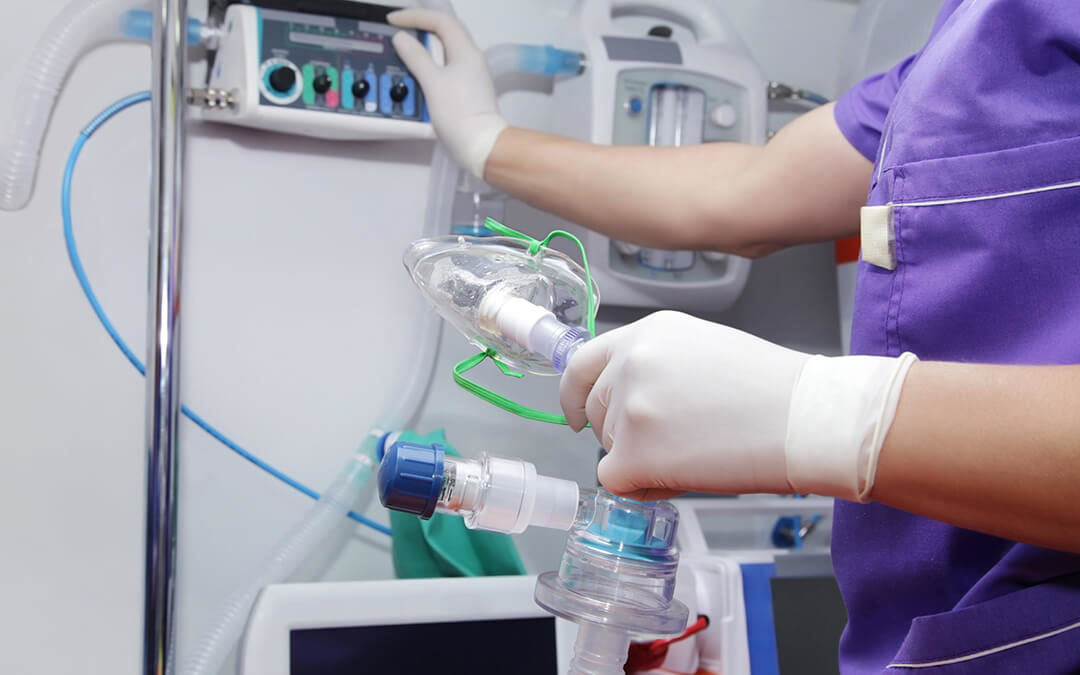 Nurse ambulance with oxygen mask in hand