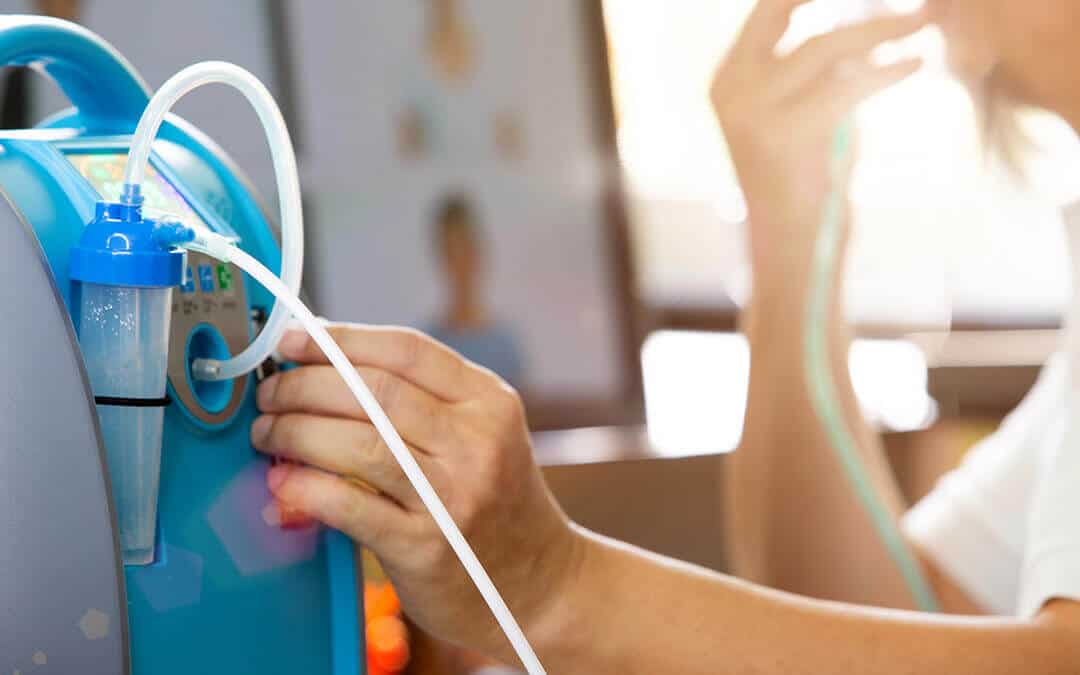 A person using an oxygen concentrator