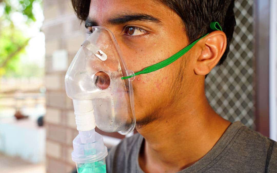 patient using oxygen mask