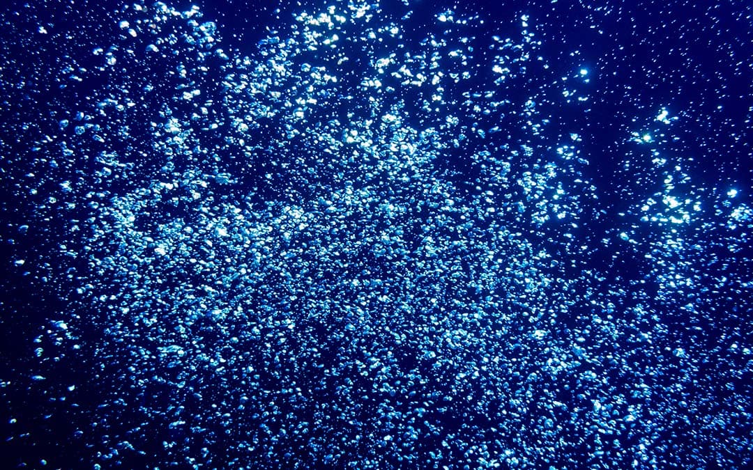 Bubbles in the ocean under water