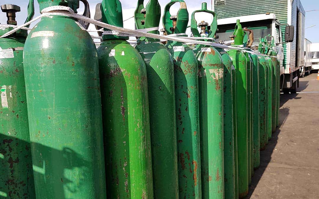 Global Challenges in Medical Oxygen Access: green oxygen tanks