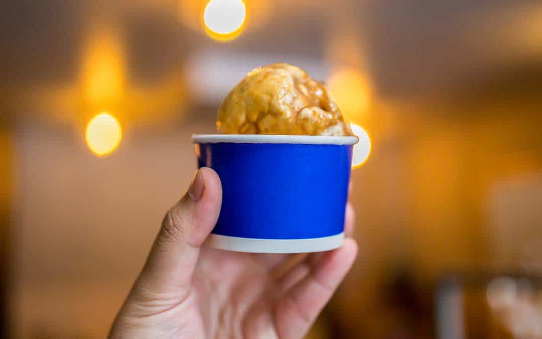 Liquid Nitrogen Ice Cream: scoop of caramel ice cream in a blue cup
