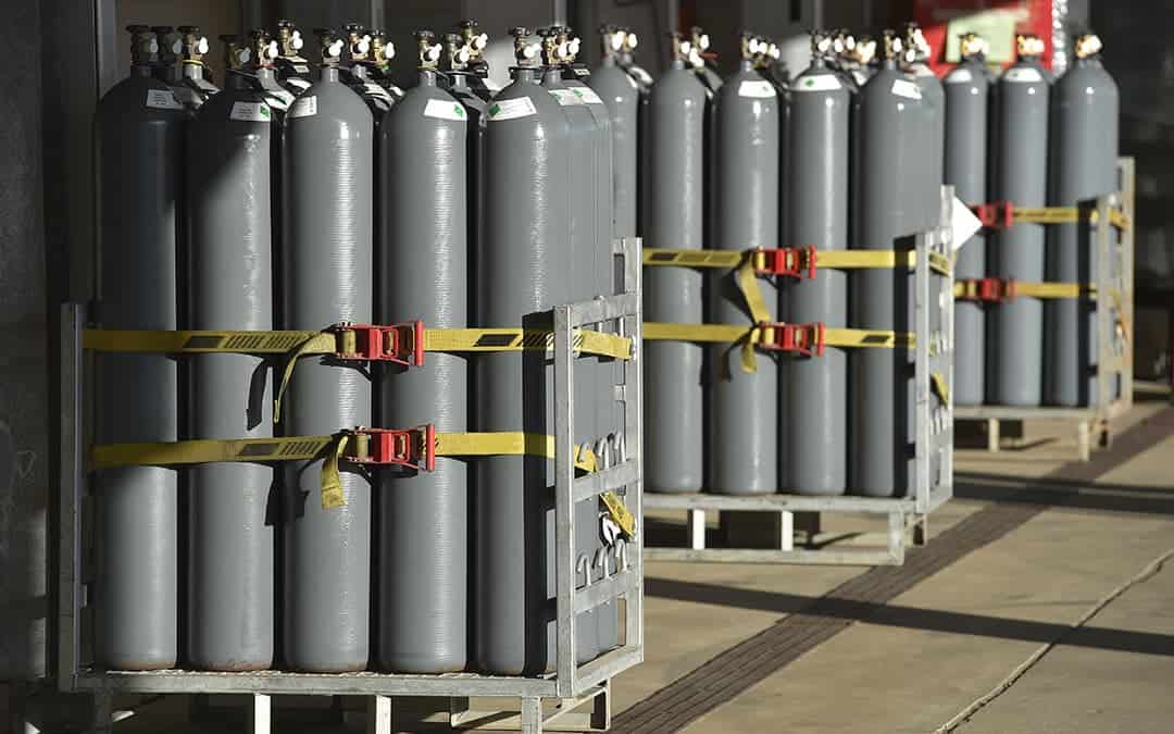 Nitrogen gas storage tanks in groups on palettes