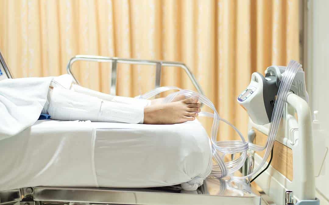 Patient in hospital with compression boots on. 
